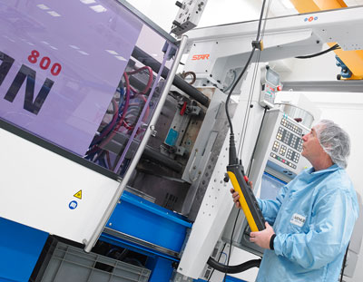 Employee in cleanroom environment