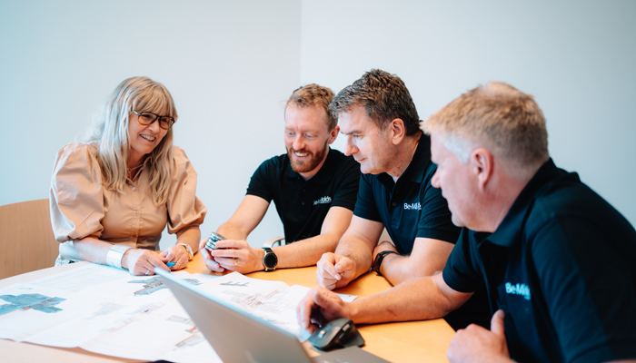 Be-Må Molds employees in a conference