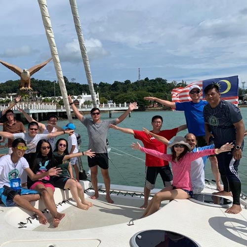 Nolato Malaysia -  employees on a boat