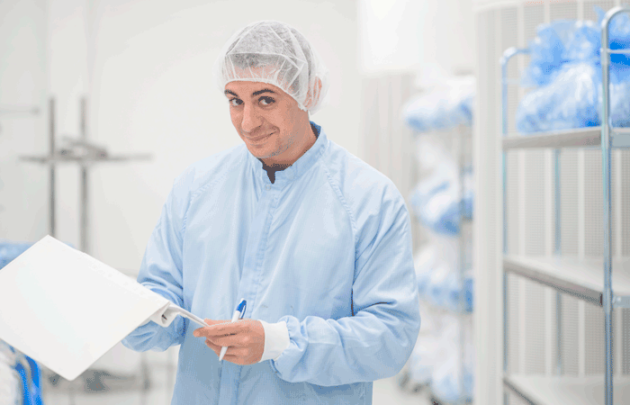 Nolato MediTech- man in clean room production