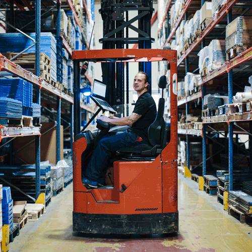 Employee at Nolato Lövepack sitting in a truck