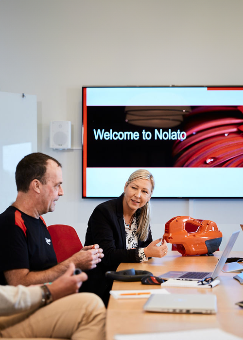 Nolato employees in meeting