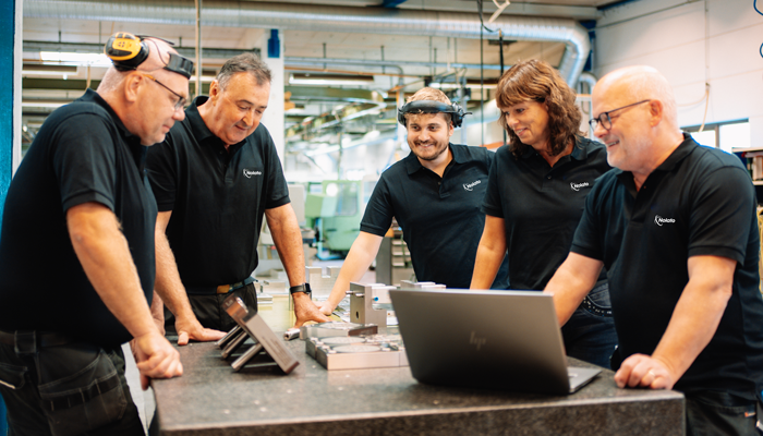 Nolato employees in a meeting.