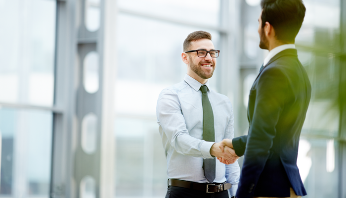two men shaking hands