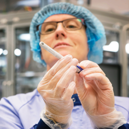 Employee in clean room production
