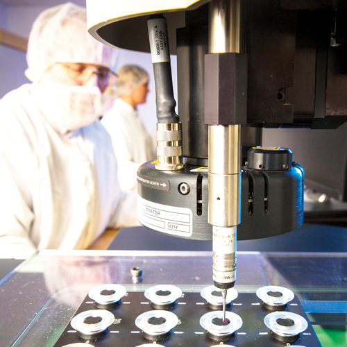 Employee in clean room production