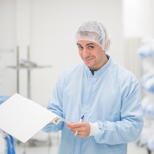 Employee in clean room production