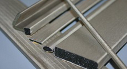 Conductive fabric wrapped sponge products