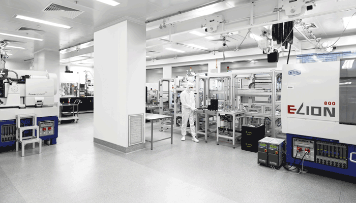Employee in clean room production