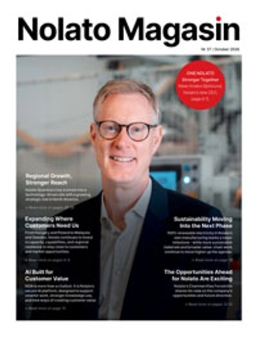 Nolato Magasin cover featuring a smiling man in glasses and a suit jacket, in an industrial setting, with headlines.