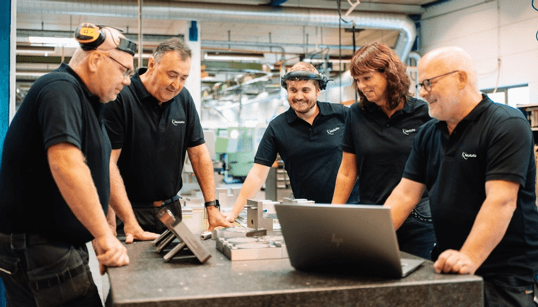 Nolato employees in a meeting.